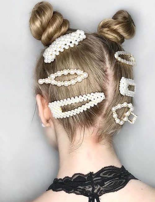Twisted-space-buns-with-pearl-accessories